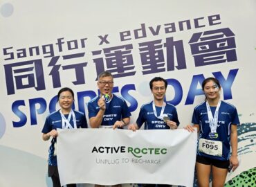 Roctec colleagues hold their medals.